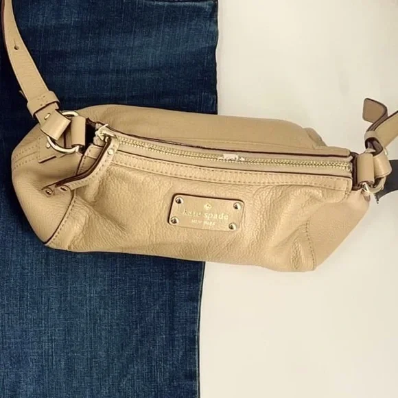 Cream color Kate spade. Great condition. Black and white polka dot inside. - Picture 1 of 5